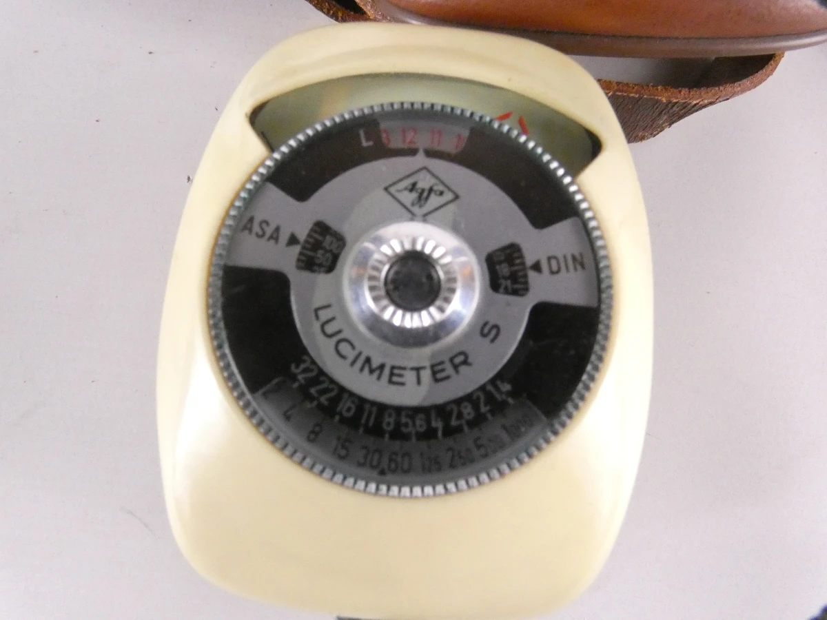 Vintage Rolleiflex camera met accessoires en leren hoes