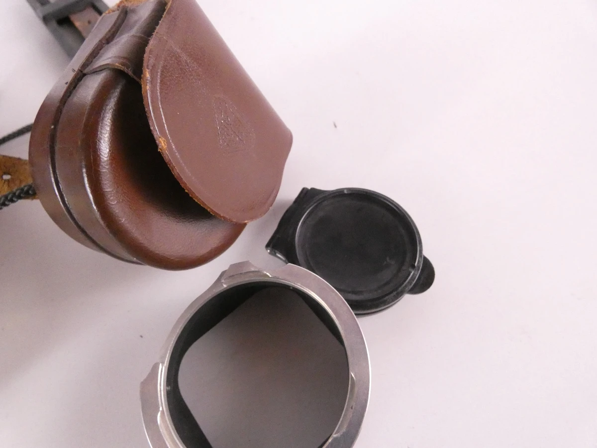 Vintage Rolleiflex camera met accessoires en leren hoes