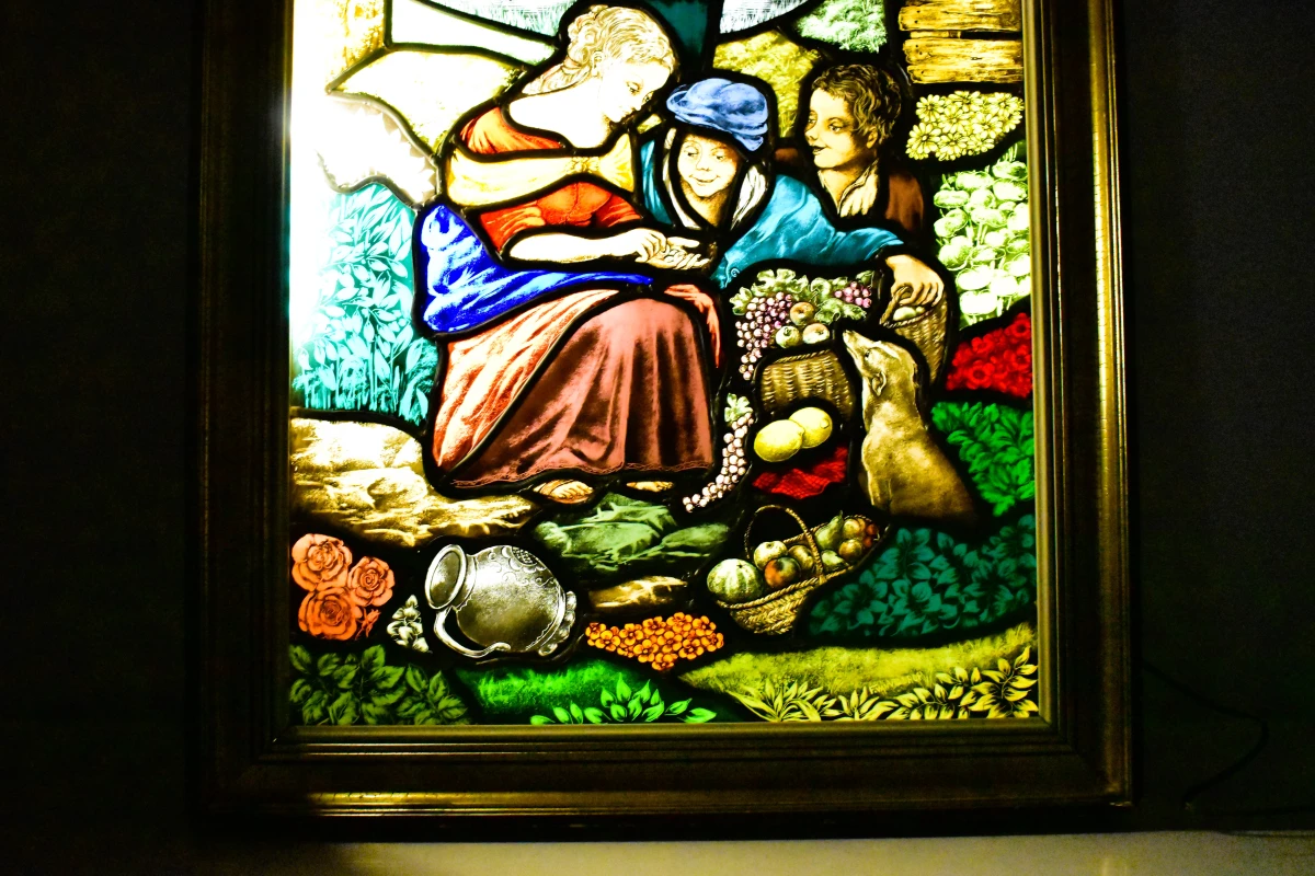 Verlicht glas-in-lood paneel met dorpsscène