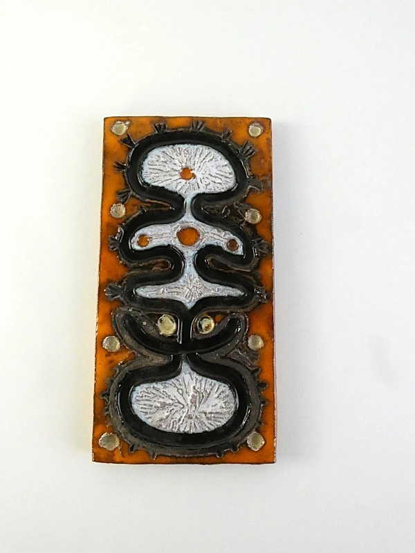 Keramisch wandpaneel met abstracte motieven