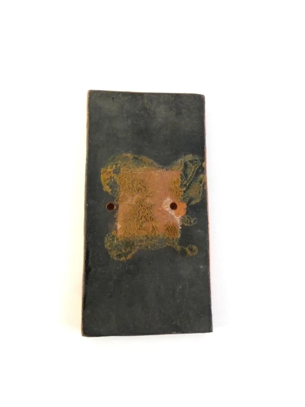 Keramisch wandpaneel met abstracte motieven