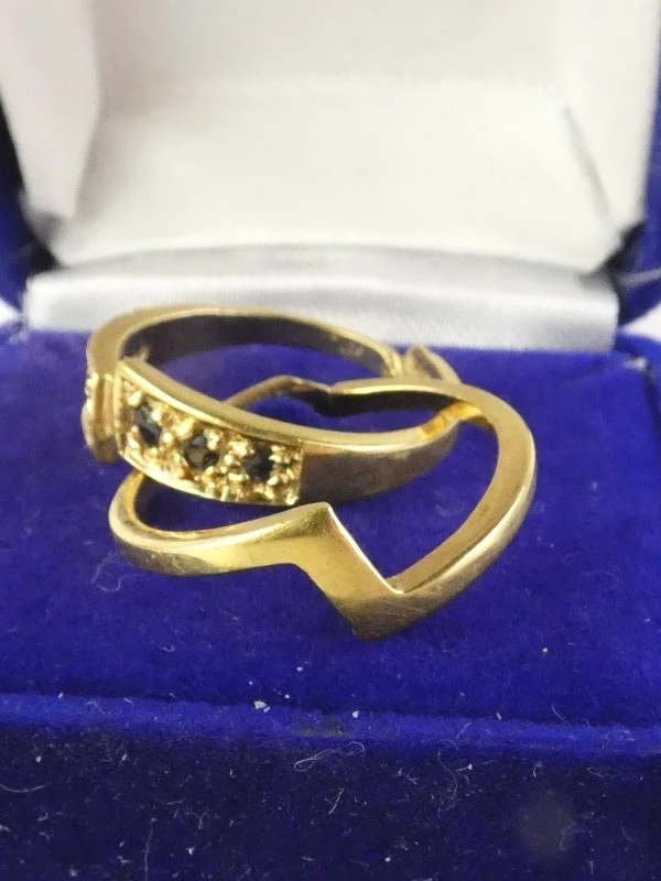 Vergulde 18 kt damespuzzelring
