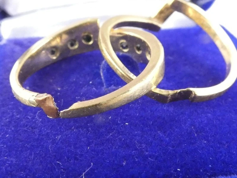 Vergulde 18 kt damespuzzelring