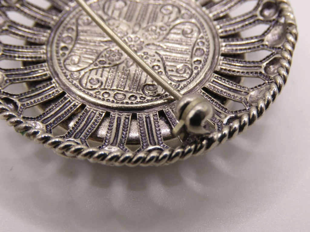 Vintage broche met Atomium afbeelding