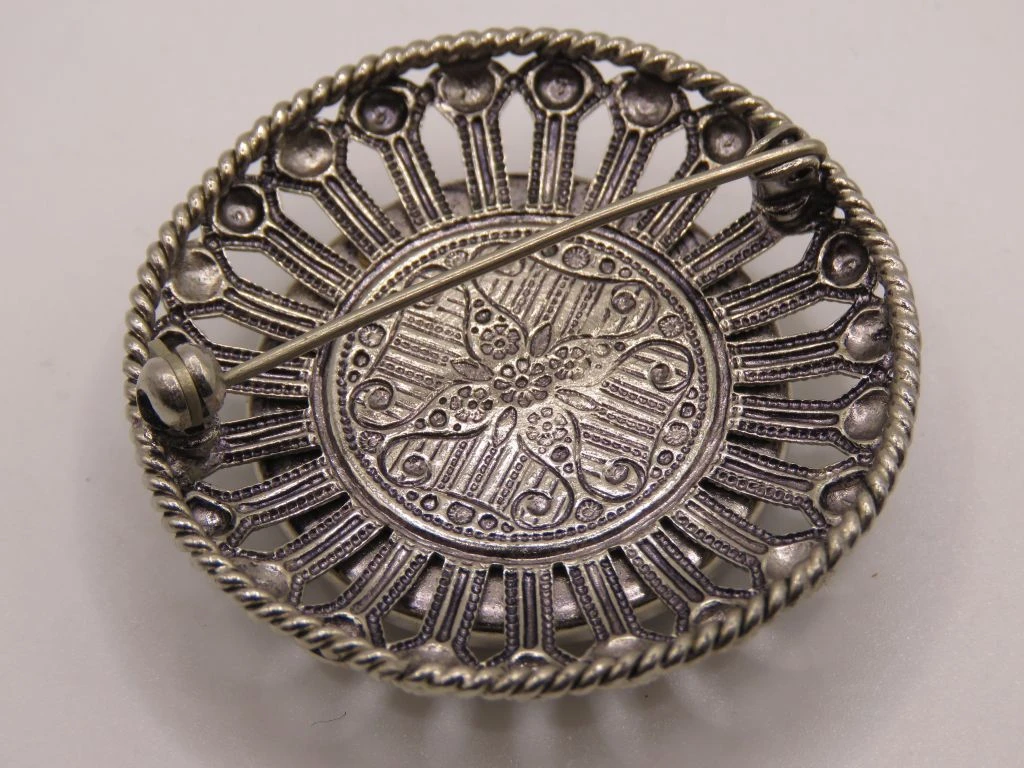Vintage broche met Atomium afbeelding