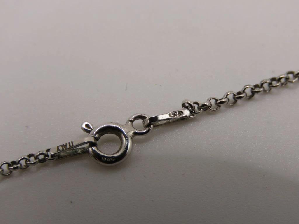 Zilveren ketting met hartvormige hanger en parel