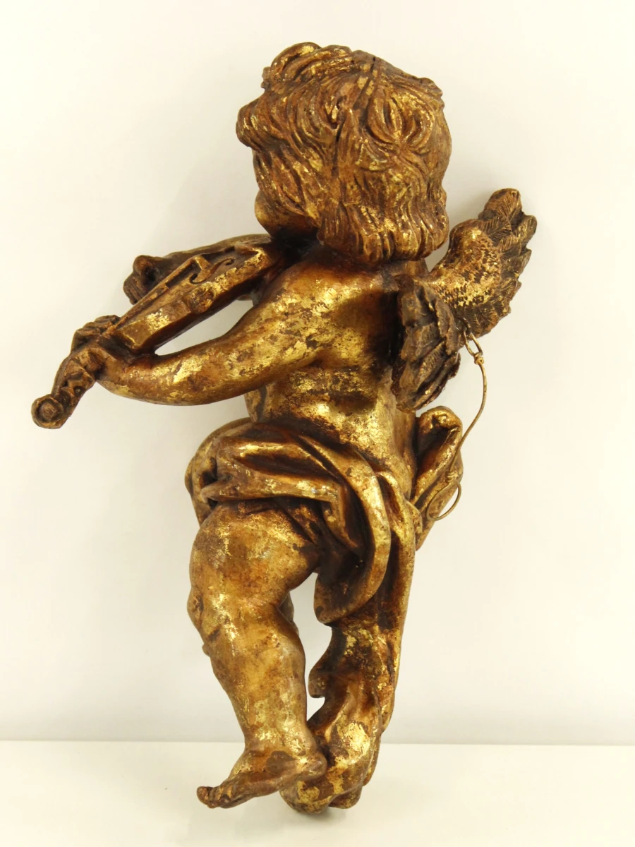 Decoratieve, gouden engelbeeldje met viool