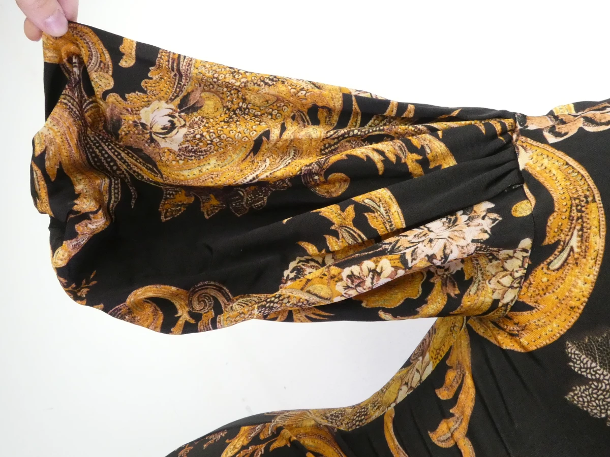 Dames jurk met barokprint en halflange mouwen