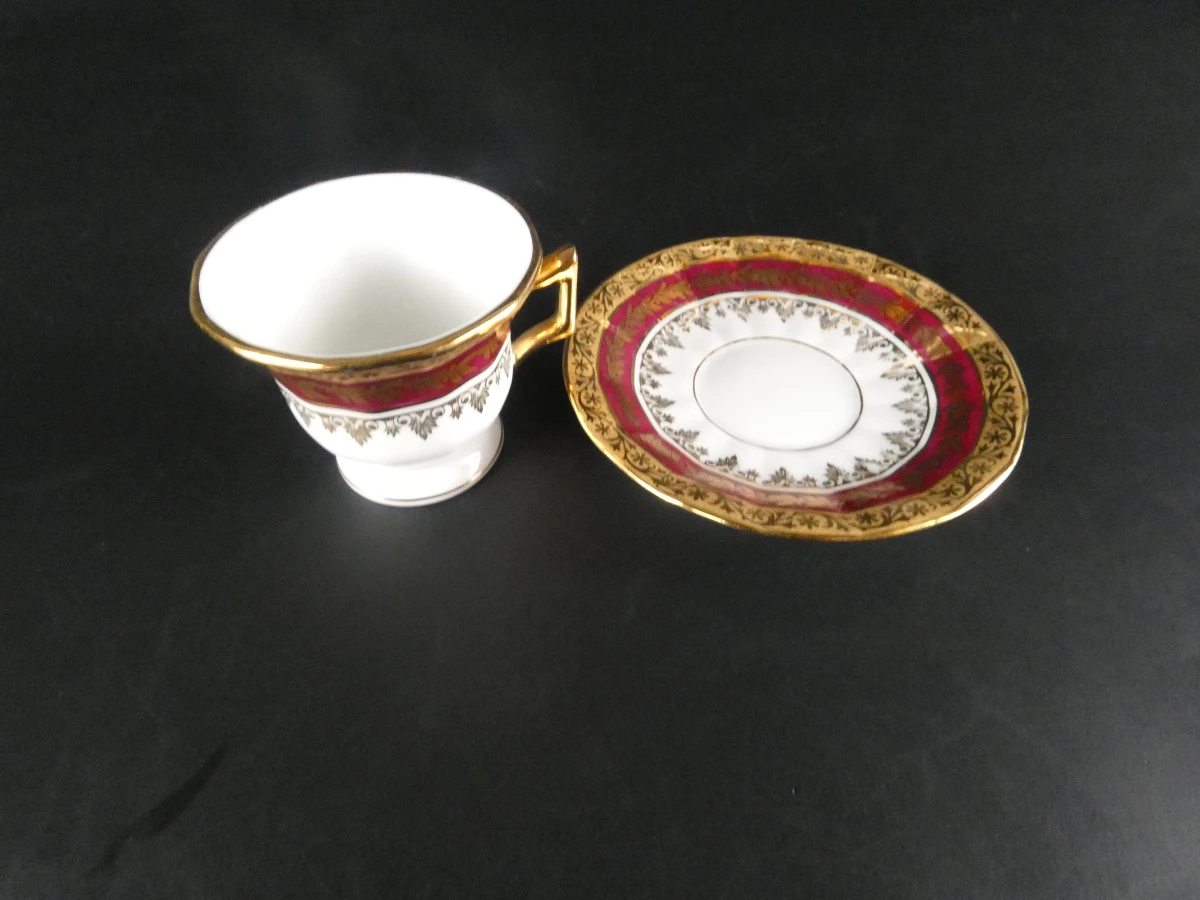 11 Limoges koffiekopjes en ondertasjes