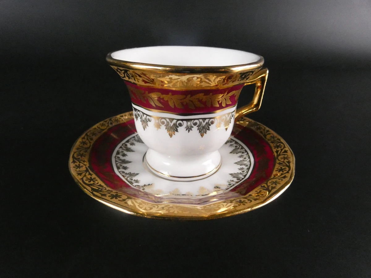 11 Limoges koffiekopjes en ondertasjes