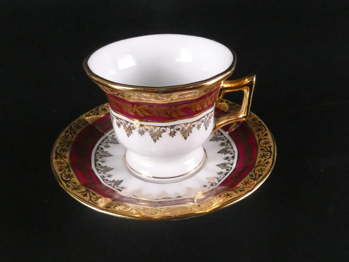 11 Limoges koffiekopjes en ondertasjes
