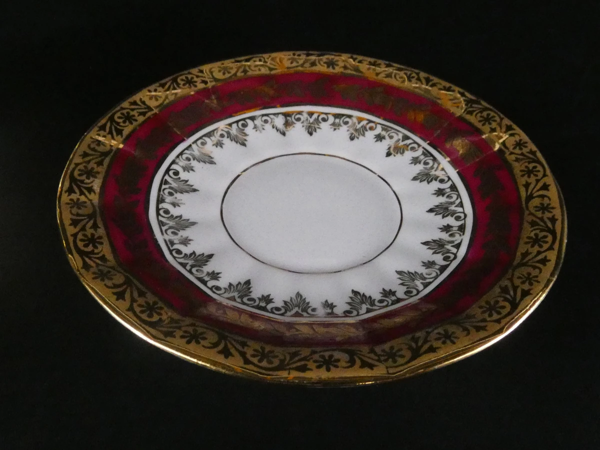 11 Limoges koffiekopjes en ondertasjes