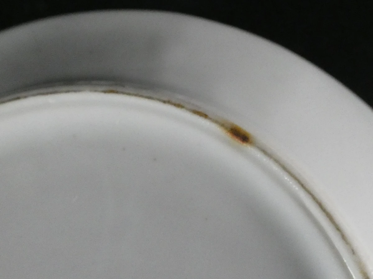 11 Limoges koffiekopjes en ondertasjes
