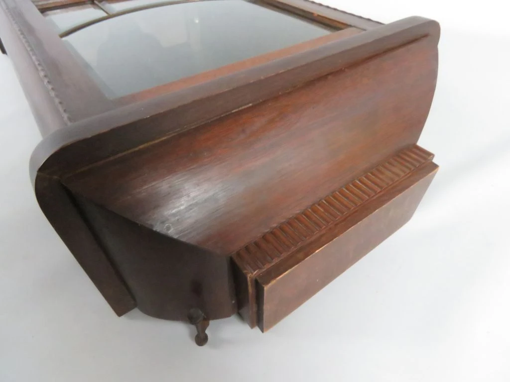 Antieke houten wandklok met slinger