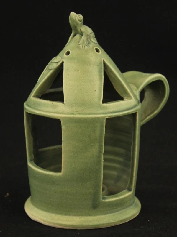 Groen keramisch theeservies met dierenmotieven