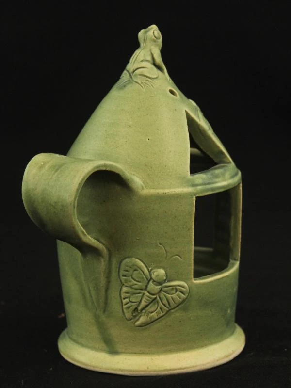Groen keramisch theeservies met dierenmotieven
