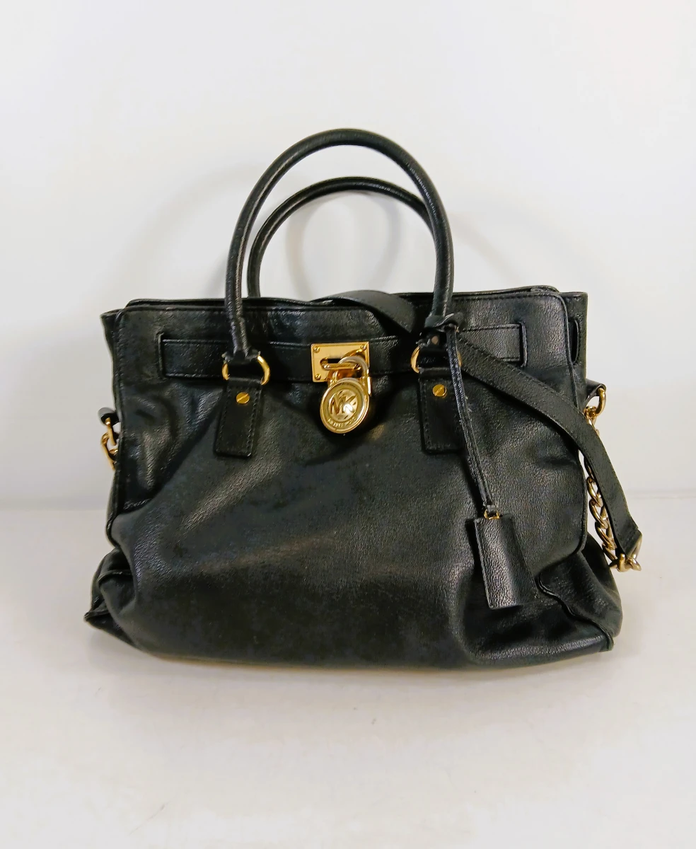 Michael Kors zwarte leren handtas met gouden accenten