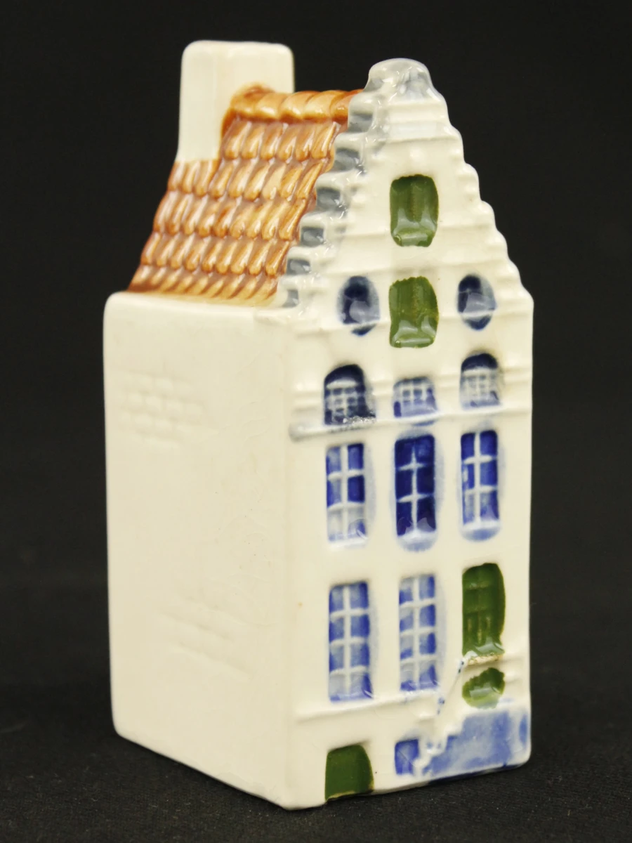 Set van 4 handgeschilderde Delfts blauwe keramische huisjes