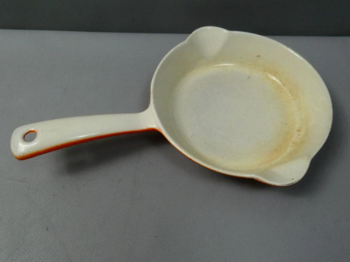 Vintage oranje geëmailleerde braadpan met handvat