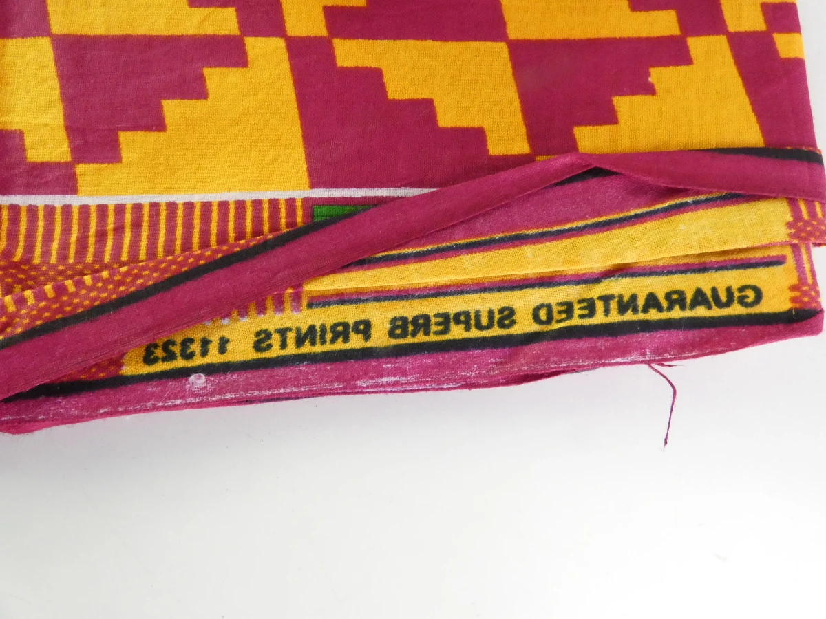 Set van kleurrijke Afrikaanse waxprints en headwraps