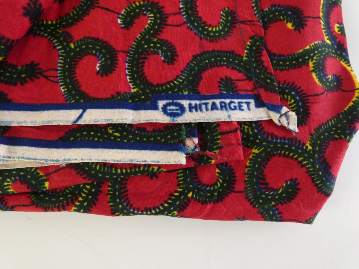 Set van kleurrijke Afrikaanse waxprints en headwraps