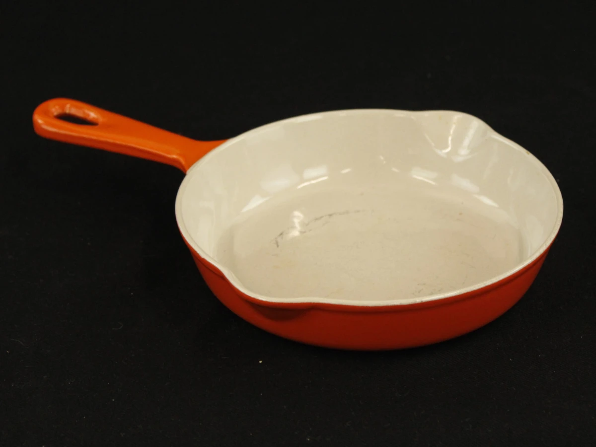 Set Le Creuset gietijzeren pannen en ovenschaal