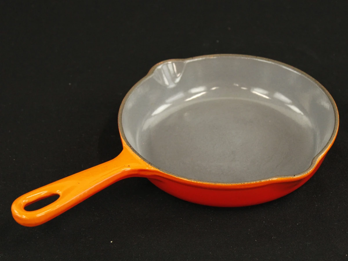 Set Le Creuset gietijzeren pannen en ovenschaal