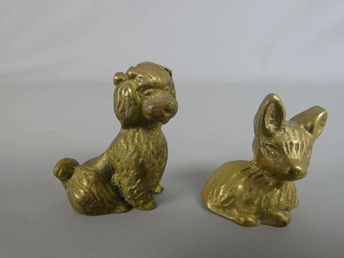 Twee messing dierfiguurtjes