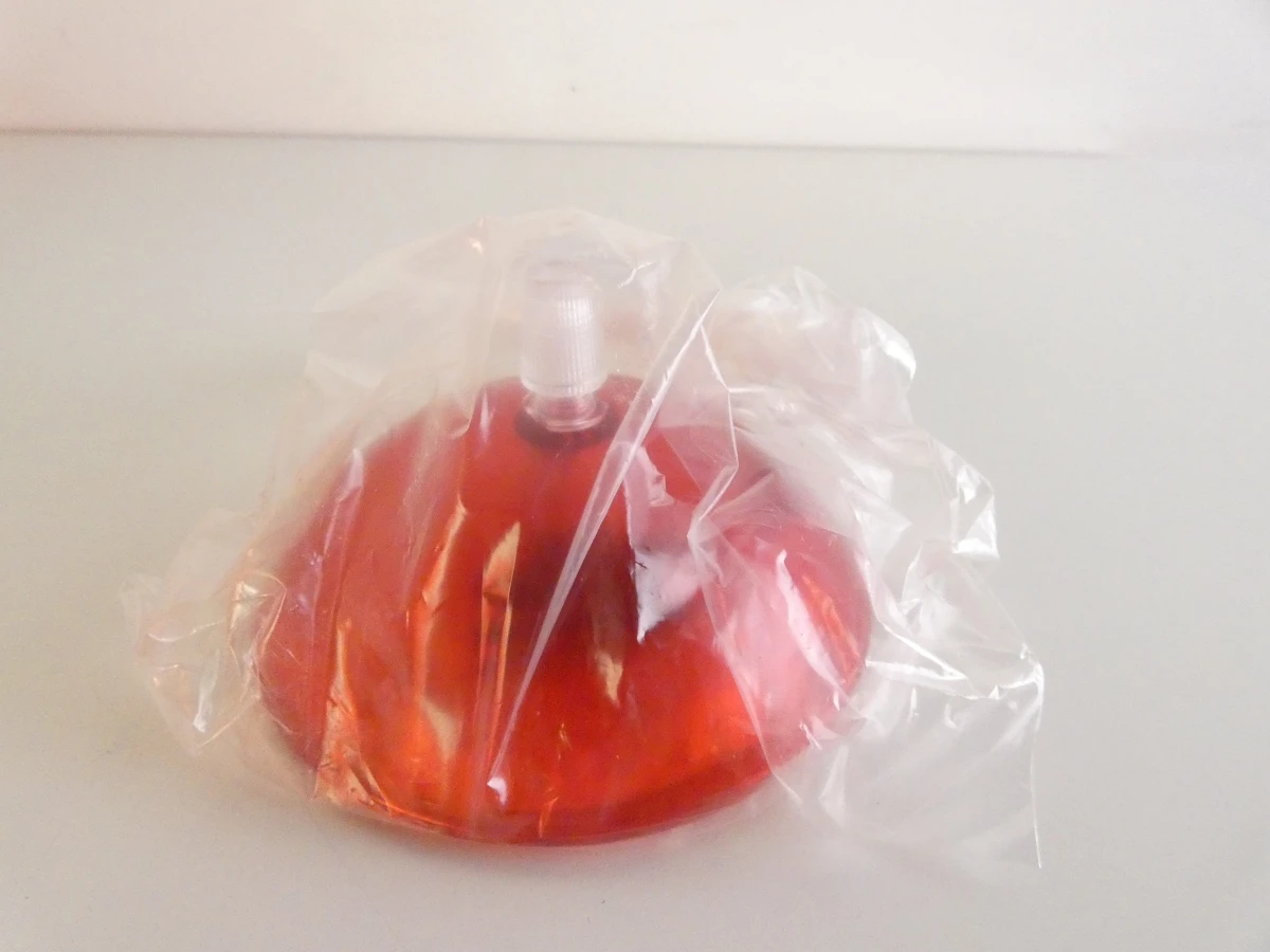 Oranje hanglamp Kartell Fly design Fermuccio Laviani