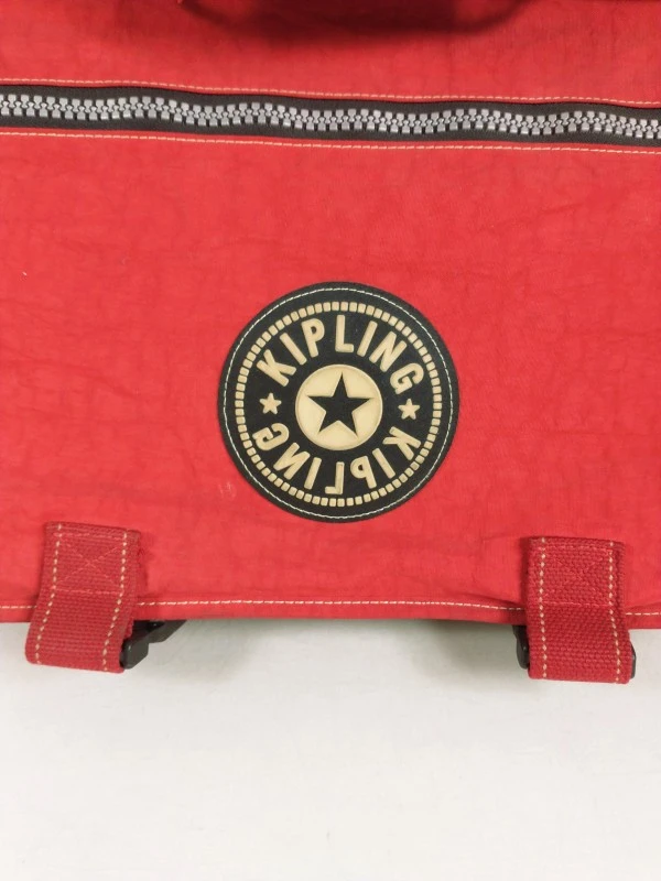 Kipling rugzak/schooltas in rood met etui en 6 aapjes-sleutelhangers