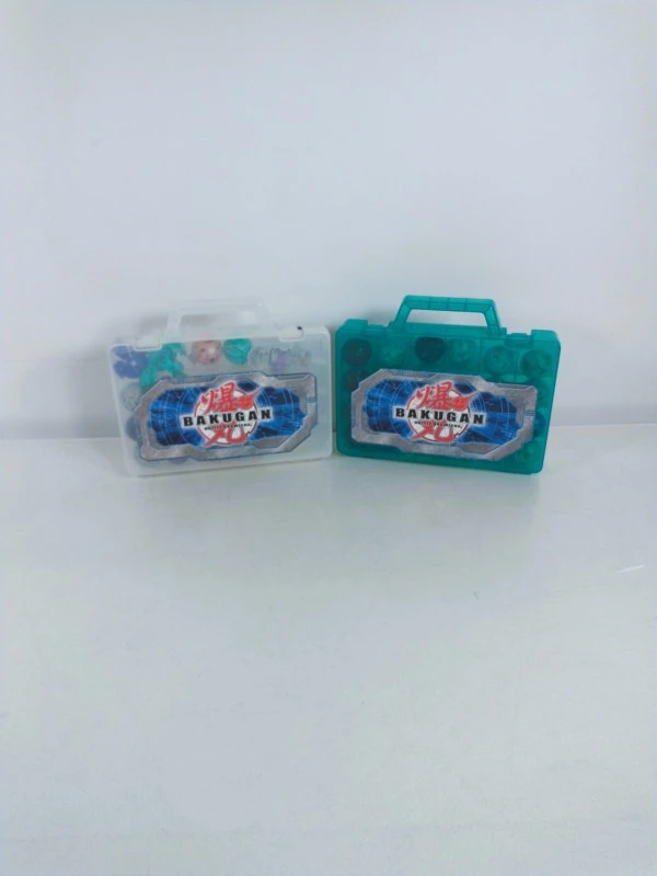 Grote partij Bakugan Battle Brawlers met figuren, kaarten, opbergkoffers en draagcase